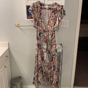 Worn once as wedding guest. Wrap dress. Ruffle sleeves